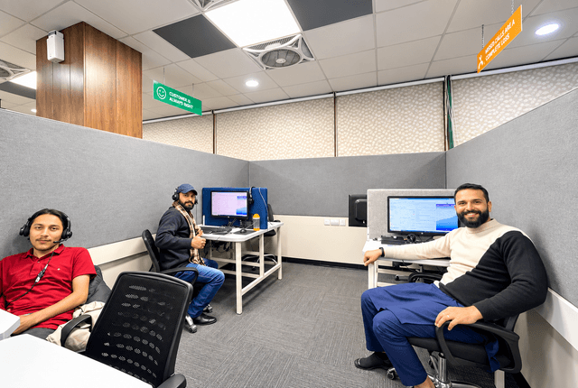 ORiON colleagues posing together in the call centre